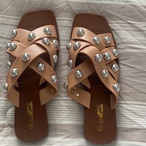 Nude with stud sandals